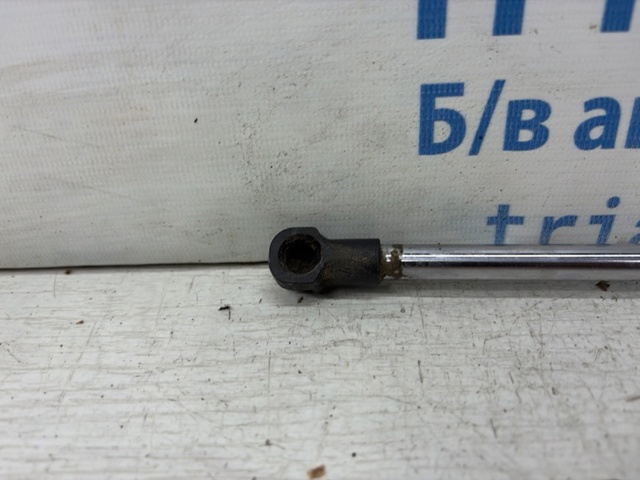 Амортизатор кришки багажника EG2162620D MAZDA