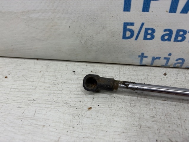 Амортизатор двері 3/5-ї задньої EG2163620D MAZDA