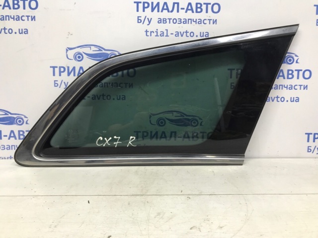 Скло багажного відсіку, праве EG2262950C MAZDA