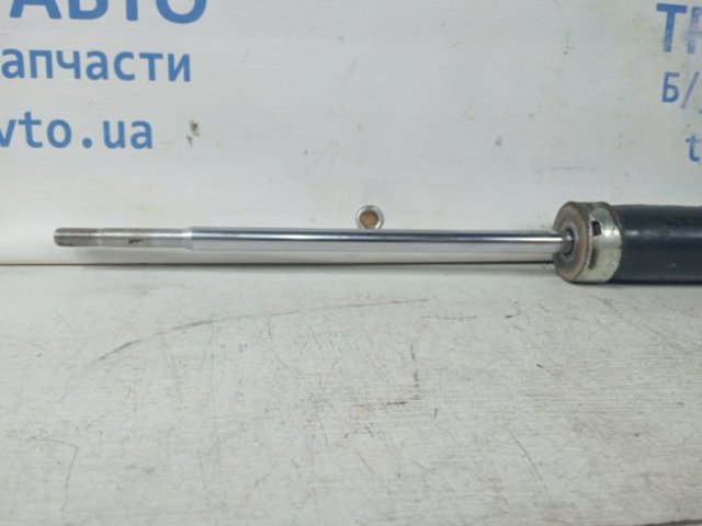 Амортизаційна стійка задня EH1428910 MAZDA