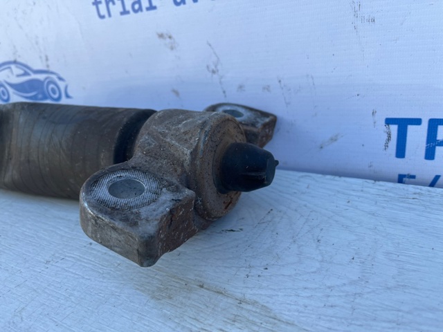 Стійка амортизатора задня F2GZ18125N FORD