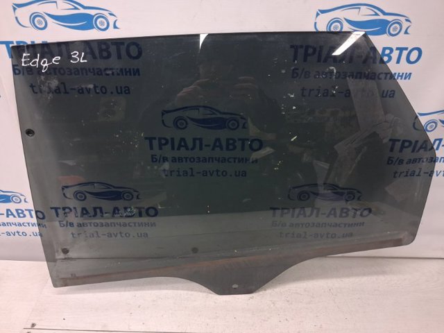 Скло заднє ліве FT4Z5825713A FORD