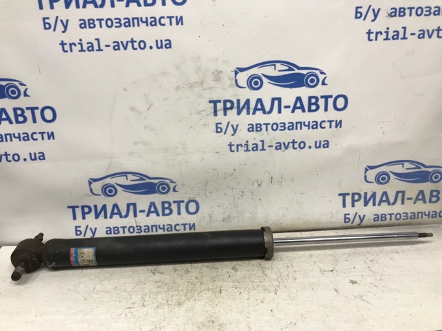 Стійка амортизатора задня Мазда 6
