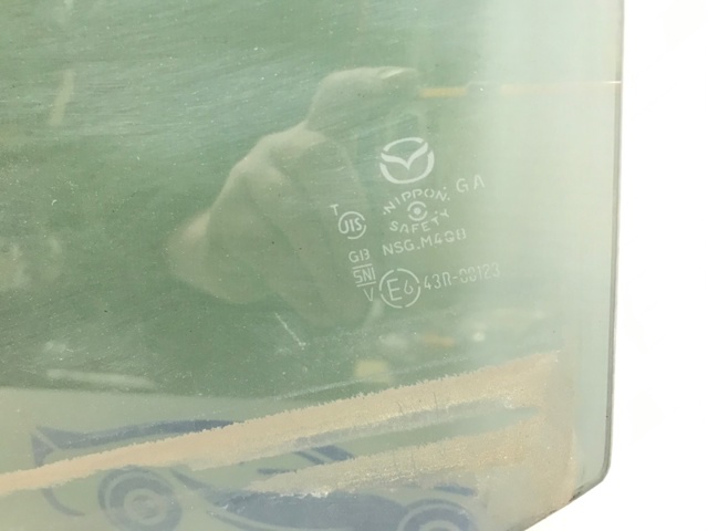 Скло заднє ліве GHK573510B MAZDA