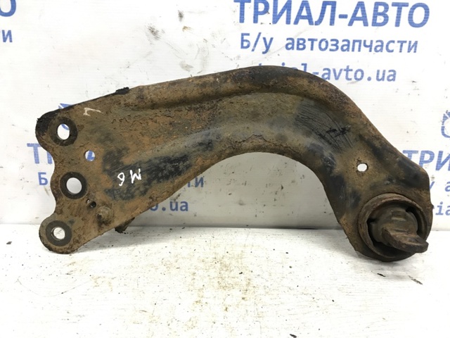 Важіль/тяга задньої підвіски подовжній нижній, лівий GHP928250A MAZDA
