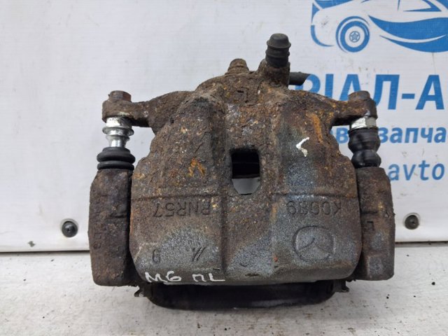 Супорт гальмівний, передній, лівий GHY93399Z MAZDA