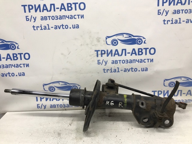 Амортизатор передньої підвіски GMM634700 MAZDA