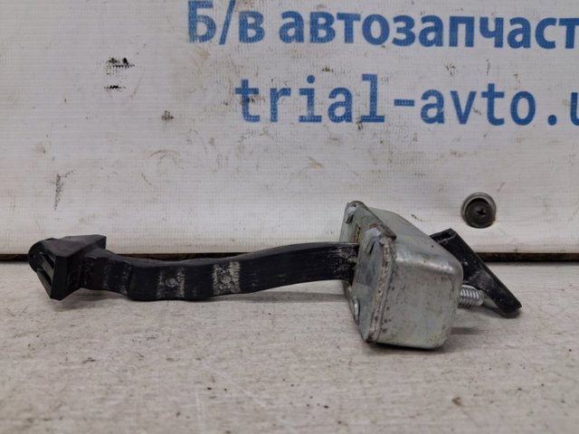 Обмежувач відкриття дверей, задній GS1D72270B MAZDA
