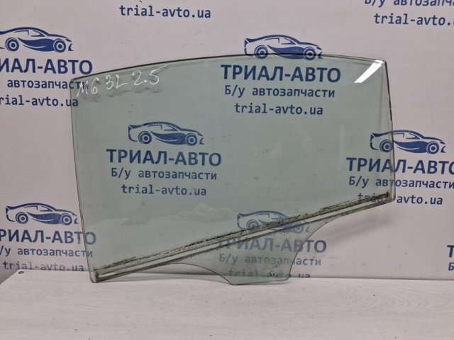 Скло заднє ліве GS1D73511 MAZDA