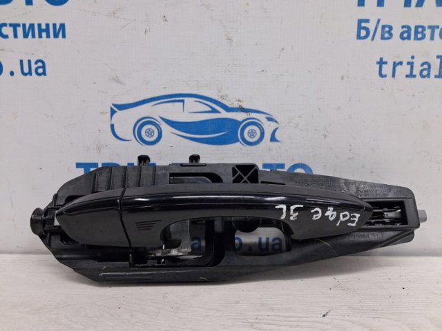 Ручка задньої двері зовнішня ліва JS7Z5426605CAPTM FORD