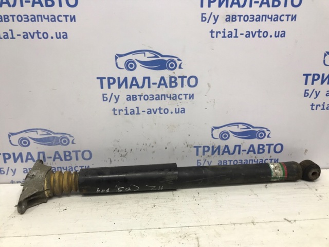 Амортизатор задній K07028910A MAZDA
