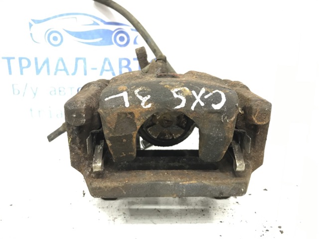 Задній гальмівний супорт лівий K0Y12699Z MAZDA