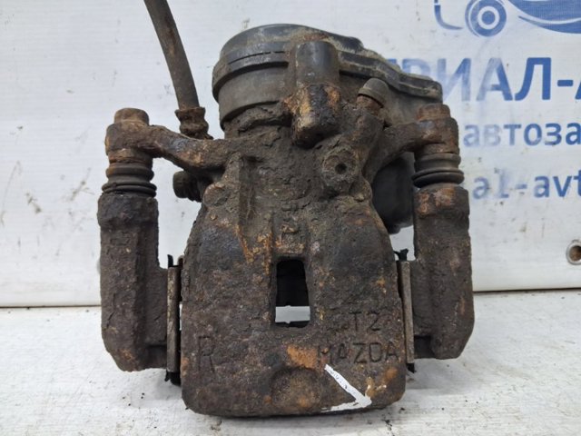Скоба супорту заднього KAY02628X MAZDA