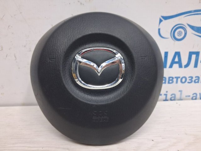 Подушка в кермі KD4557K00B02 MAZDA
