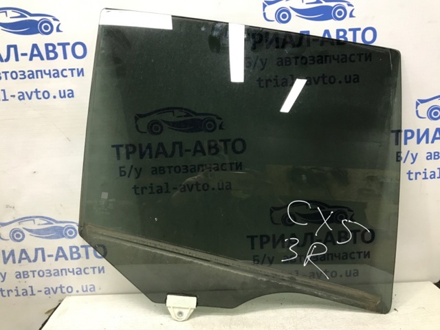 Скло задньої двері правої KD4772510 MAZDA