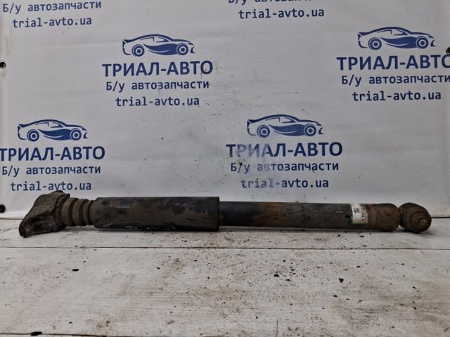 Стійка амортизатора задня KF2028910 MAZDA