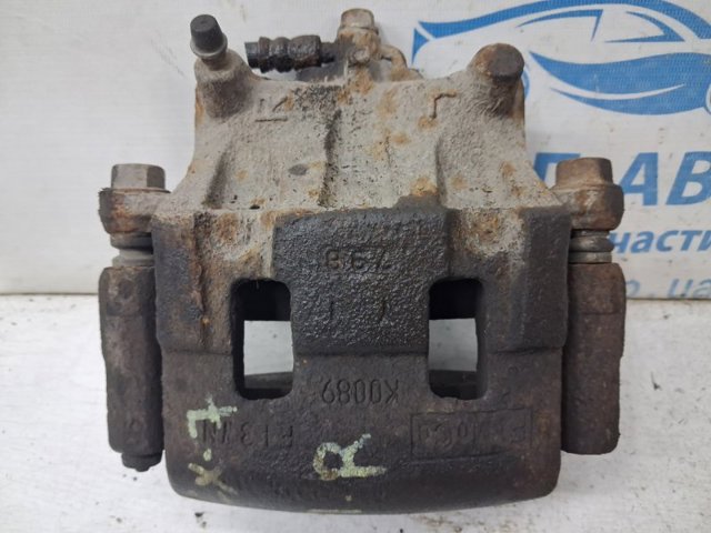 Супорт гальмівний, передній, правий L20633980A MAZDA