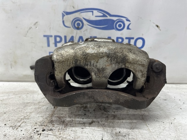Супорт гальмівний, передній, правий L23233980F MAZDA