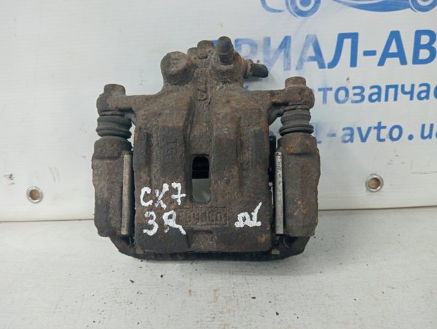 Супорт гальмівний задній правий L2Z62698ZA MAZDA