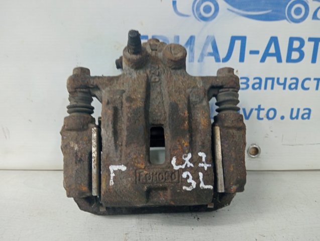 Задній гальмівний супорт лівий L2Z62699ZA MAZDA