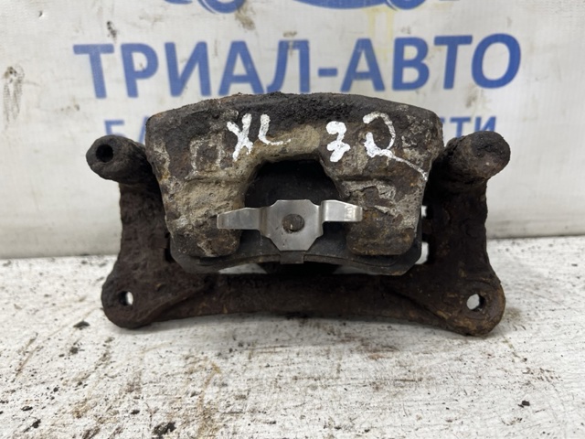 Супорт гальмівний задній правий MN116310 MITSUBISHI