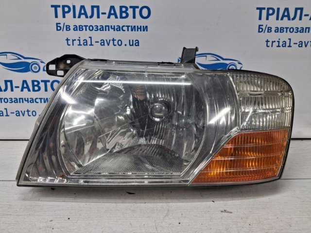Фара ліва передня MN133747 MITSUBISHI