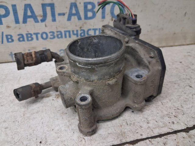 Дросільна заслінка в зборі MN195709 MITSUBISHI