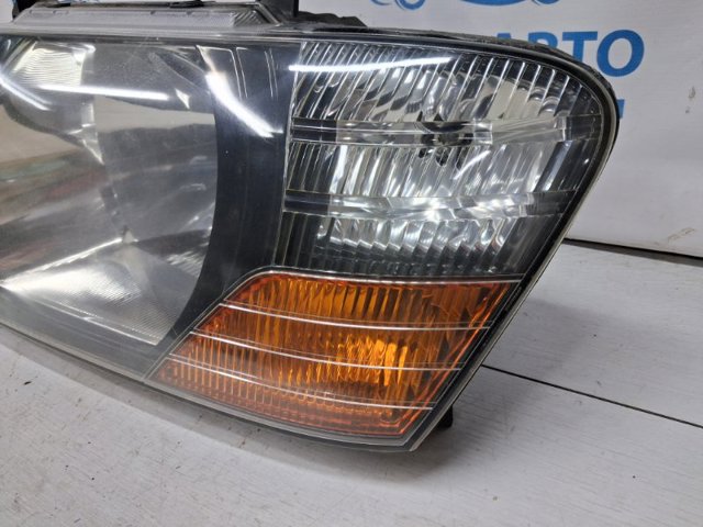 Основна фара в зборі ліва MR548033 MITSUBISHI