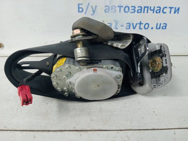 Важіль фіксатора ременя безпеки передній MR610574 MITSUBISHI