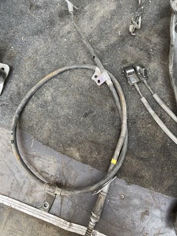 Трос ручника задній правий 597703Q300 HYUNDAI