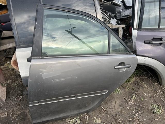 Замок задніх дверей, лівих 6906033071 TOYOTA