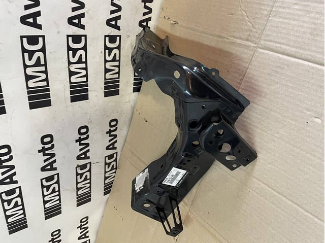 Рамка радіатора права TK4853140 MAZDA