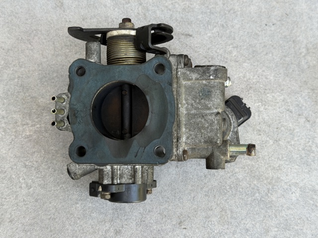 Блок дросельної заслінки MD327594 MITSUBISHI