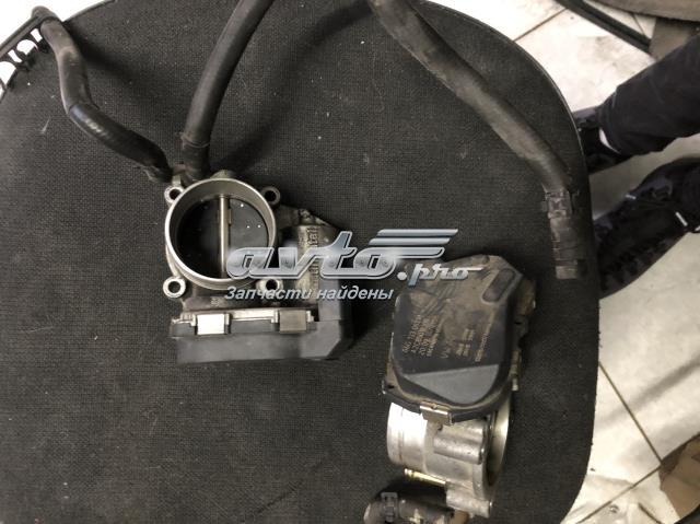 Дросільна заслінка в зборі 06G133062M VAG