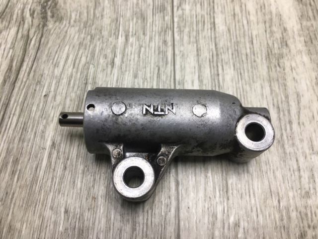 Натягувач ременя ГРМ 1145A031 MITSUBISHI