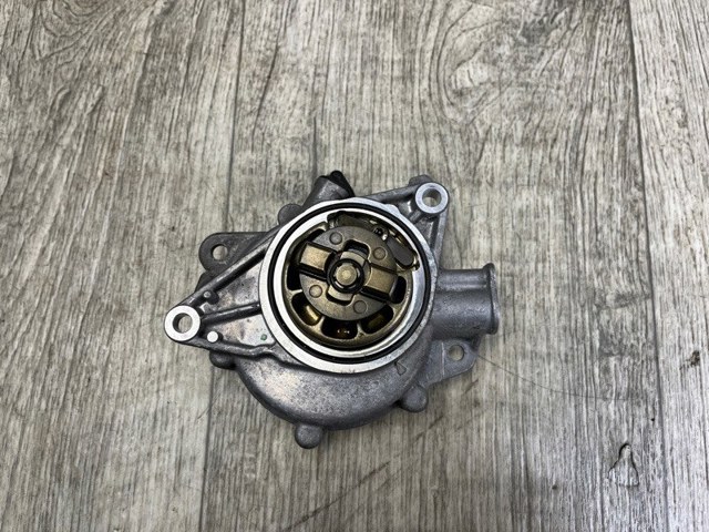 Насос вакуумний 11667556919 BMW