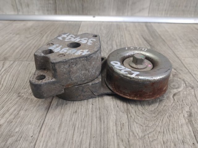 Натягувач приводного ременя 1345A062 MITSUBISHI