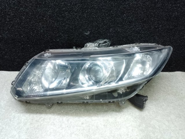 Фара ліва передня 33150TR0G01 HONDA