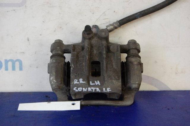 Задній гальмівний супорт лівий 58310C1A15 HYUNDAI