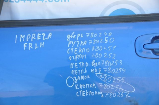 Водійські двері 60009FE013 SUBARU