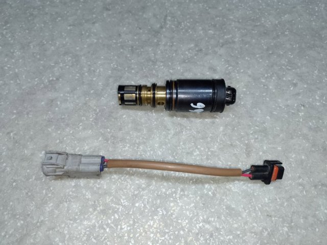 Компресор кліматичної установки 73111AJ03A SUBARU
