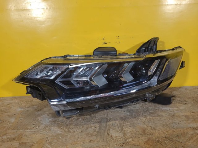 Основна фара в зборі ліва 8301D331 MITSUBISHI