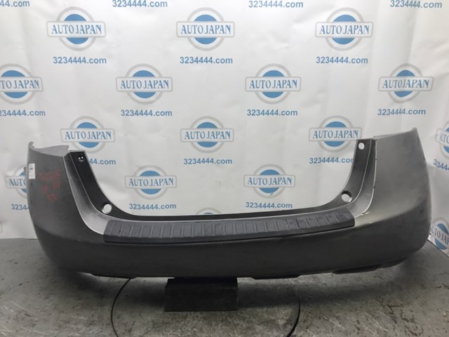 Буфер (бампер) задній 85022JM04H NISSAN