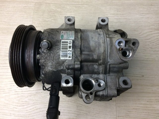 Компресор системи кондиціювання 977012H102 HYUNDAI