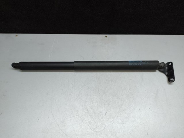 Амортизатор двері задньої A1647400645 MERCEDES