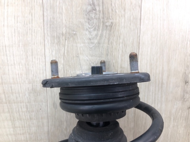 Стійка передня права BHN234700C MAZDA