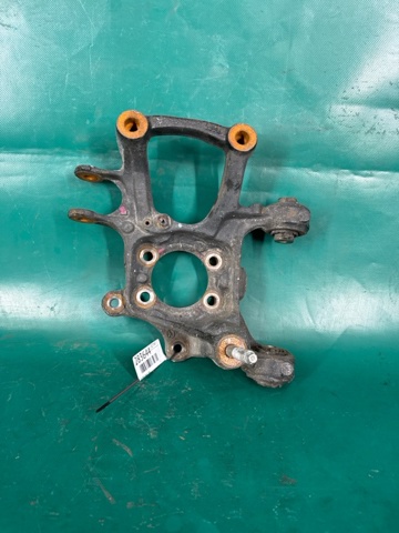 Кулак поворотний лівий BJS72612XB MAZDA