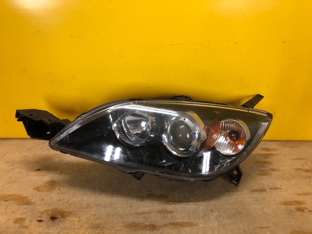 Фара основна ліва BN8P510L0B MAZDA