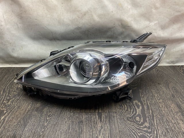 Фара ліва передня CD85510L0C MAZDA