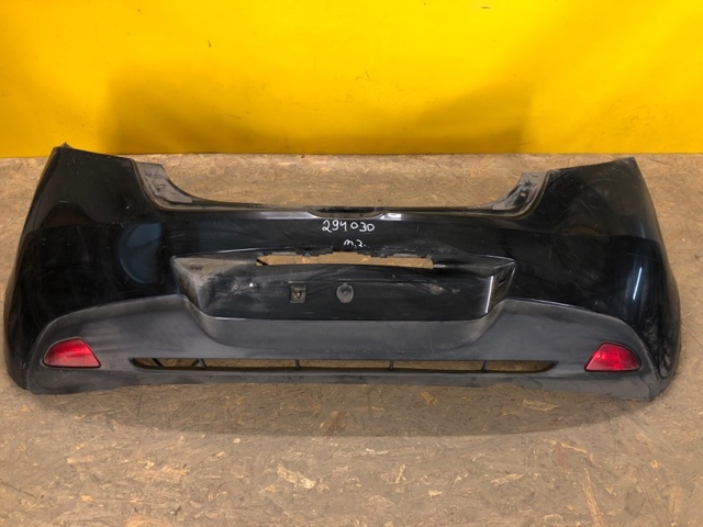 Буфер (бампер) задній D65150221 MAZDA